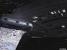 USS Enterprise NCC-1701-D with emergency pod in tractor beam (33.12K)