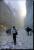 People Walking Down a Dusty Street (69.3K)